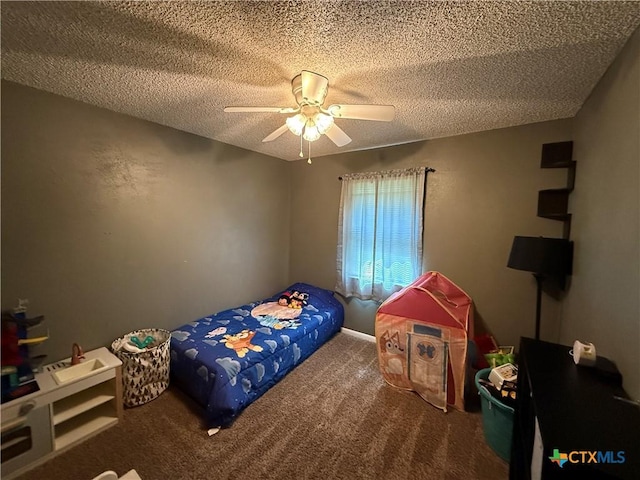 809 Michelle Dr, Copperas Cove, TX 76522 - bedroom featuring a textured ceiling, ceiling fan, and carpet
