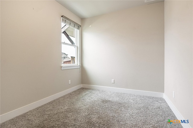 unfurnished room with carpet