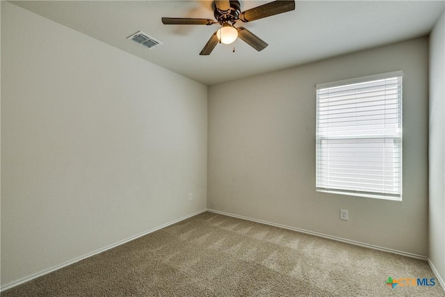 772 Armadillo Dr, Seguin, TX 78155 - carpeted empty room with visible vents, baseboards, and a ceiling fan