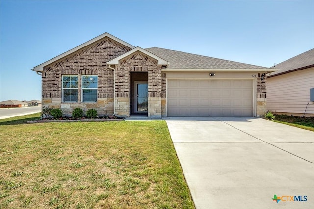 772 Armadillo Dr, Seguin, TX 78155 - view of front of house featuring a front yard, concrete driveway, stone siding, a garage, and brick siding