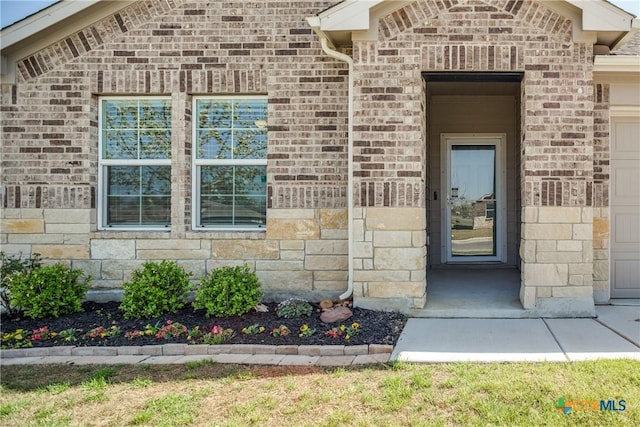 772 Armadillo Dr, Seguin, TX 78155 - property entrance with stone siding and brick siding