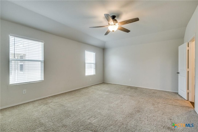 772 Armadillo Dr, Seguin, TX 78155 - spare room featuring baseboards, carpet floors, lofted ceiling, and a ceiling fan