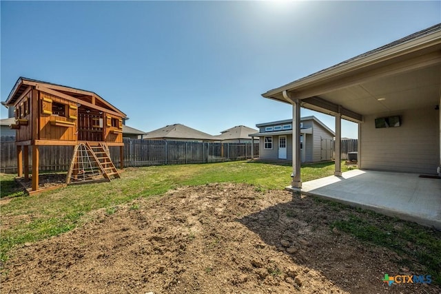 772 Armadillo Dr, Seguin, TX 78155 - view of yard featuring a patio, a playground, a fenced backyard, and an outdoor structure
