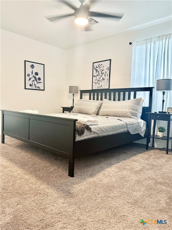bedroom with carpet flooring and ceiling fan