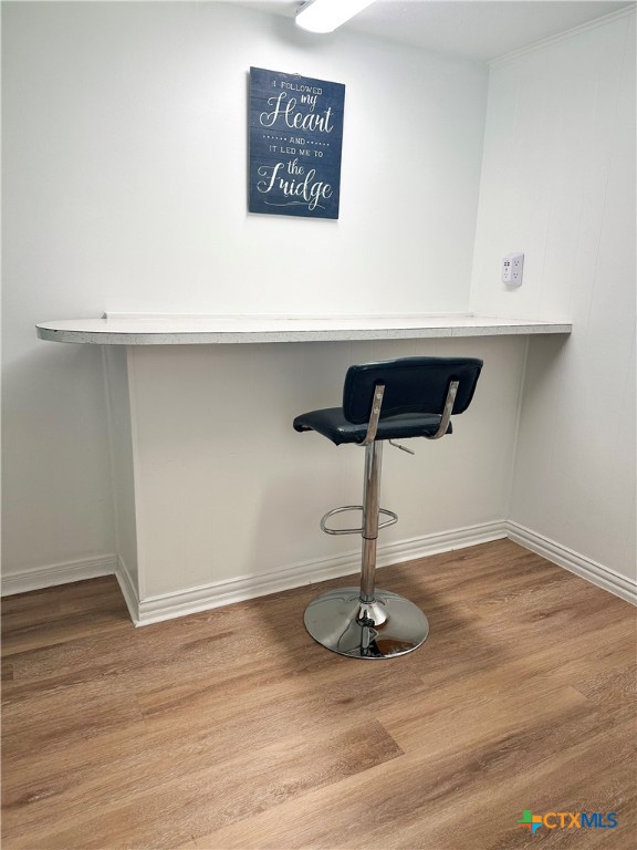 detailed view of wood finished floors and baseboards
