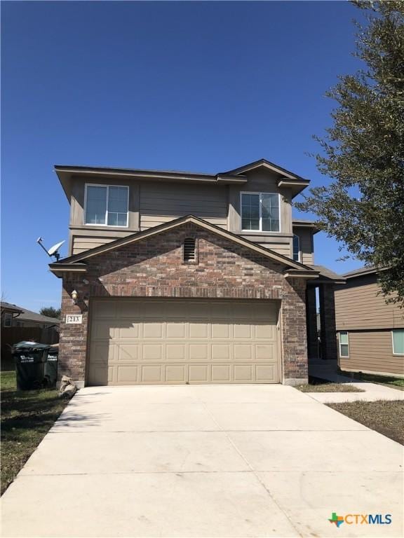 view of front of home with a garage