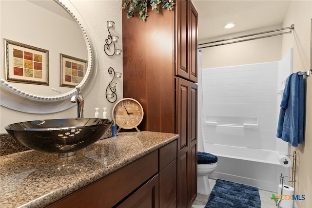 full bathroom with toilet, tile patterned floors, vanity, washtub / shower combination, and recessed lighting