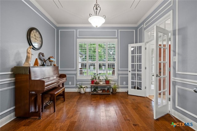 408 O W Lowrey, Salado, TX 76571 - sitting room with a decorative wall, ornamental molding, and hardwood / wood-style floors