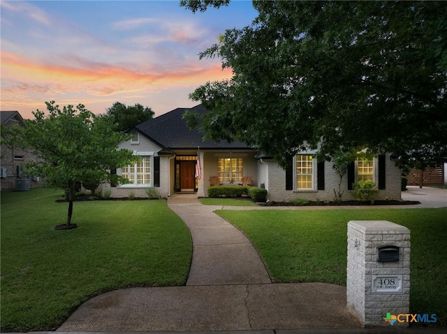 408 O W Lowrey, Salado, TX 76571 - single story home featuring a front yard and brick siding