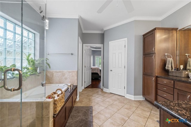 408 O W Lowrey, Salado, TX 76571 - ensuite bathroom with tile patterned flooring, ornamental molding, a bath, and ceiling fan