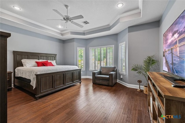 408 O W Lowrey, Salado, TX 76571 - bedroom with dark wood-style flooring, a raised ceiling, ornamental molding, baseboards, and a ceiling fan
