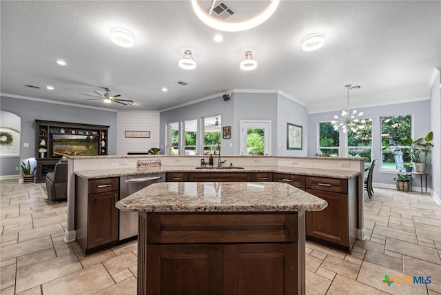 408 O W Lowrey, Salado, TX 76571 - kitchen with a sink, a center island, ceiling fan, ornamental molding, and stainless steel dishwasher