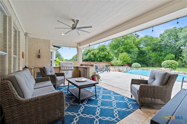 408 O W Lowrey, Salado, TX 76571 - view of patio / terrace with exterior kitchen, a ceiling fan, a pool with connected hot tub, grilling area, and an outdoor hangout area