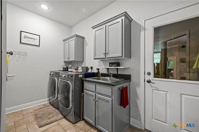 408 O W Lowrey, Salado, TX 76571 - laundry room featuring cabinet space, washing machine and clothes dryer, and baseboards