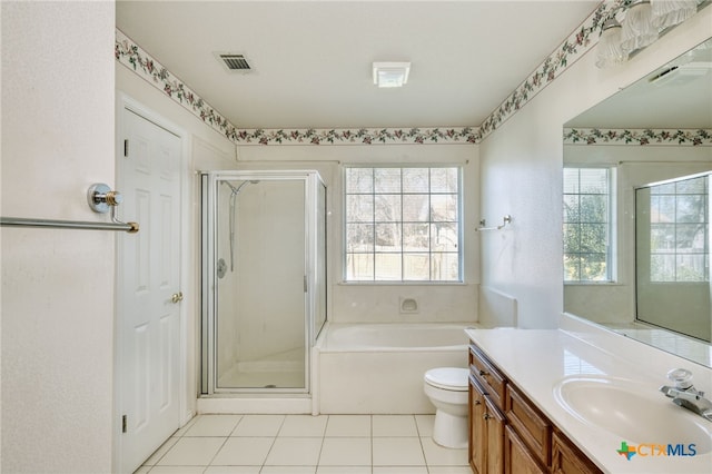 full bathroom with toilet, tile patterned floors, separate shower and tub, and vanity