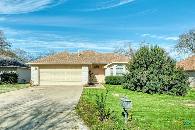 ranch-style home with a front yard and a garage