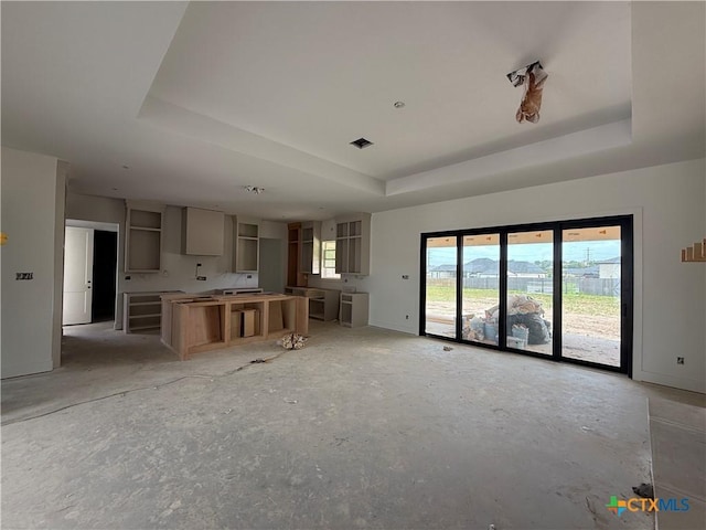 1242 Ambrose Dr, Salado, TX 76503 - unfurnished living room with a tray ceiling