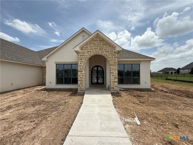 1242 Ambrose Dr, Salado, TX 76503 - view of front of property featuring brick siding and roof with shingles