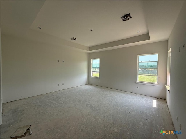 1242 Ambrose Dr, Salado, TX 76503 - empty room with a tray ceiling