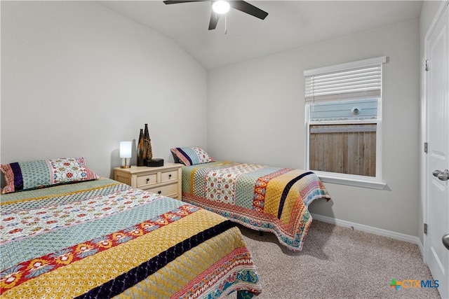 bedroom with ceiling fan, light colored carpet, and lofted ceiling