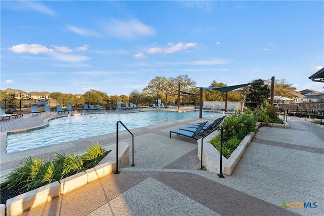 view of pool with a patio area