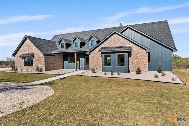 view of front of home with a front yard