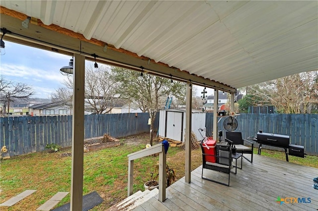 deck featuring a storage unit