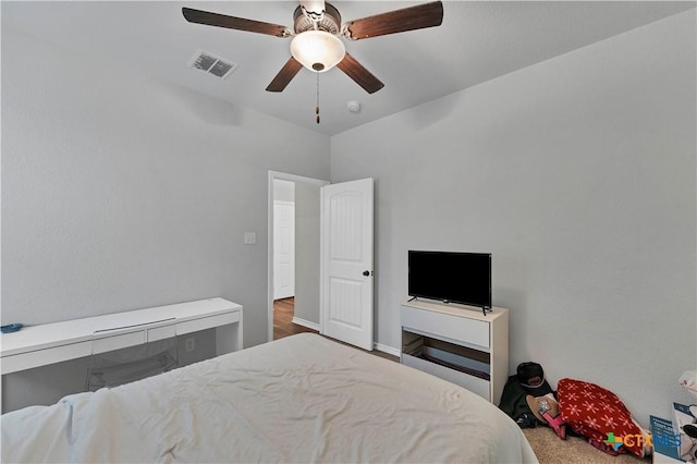 carpeted bedroom featuring ceiling fan