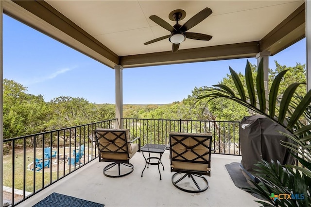 balcony with grilling area and ceiling fan