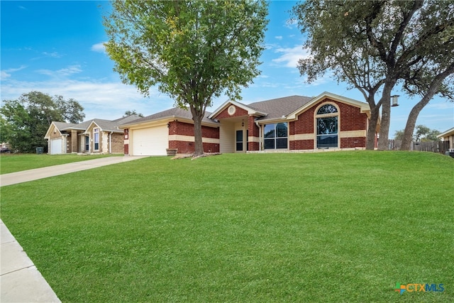 ranch-style house featuring a front lawn and a garage