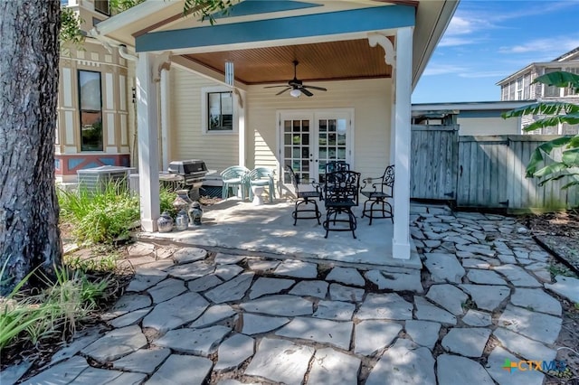 view of patio / terrace with ceiling fan and central air condition unit