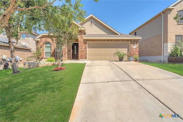 view of front of home with a garage and a front lawn