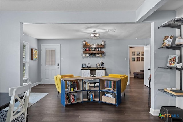 4007 Austin Ave, Waco, TX 76710 - dining space featuring wood finished floors and baseboards