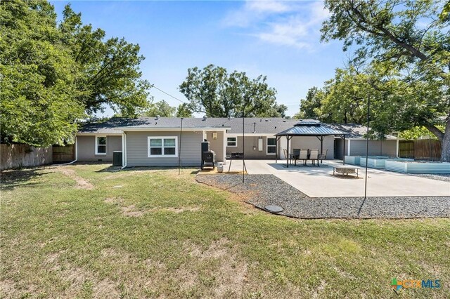 4007 Austin Ave, Waco, TX 76710 - back of house with a gazebo, a patio, a fenced backyard, and a swimming pool