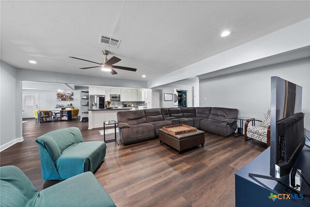 4007 Austin Ave, Waco, TX 76710 - living room with dark wood-type flooring, a ceiling fan, and recessed lighting