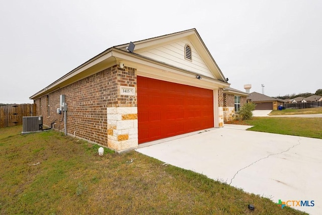 view of property exterior featuring a garage, a lawn, and central AC