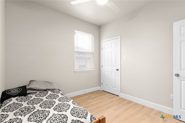 bedroom featuring wood-type flooring and ceiling fan