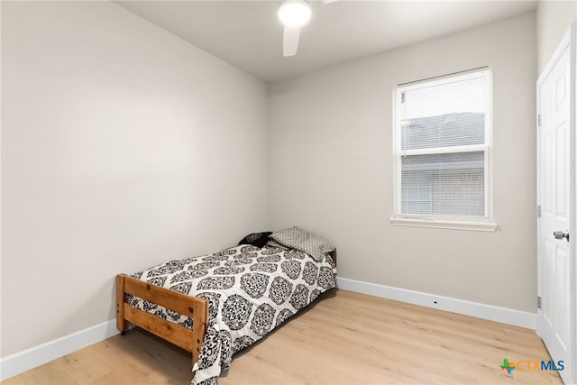 bedroom featuring ceiling fan and light wood-type flooring