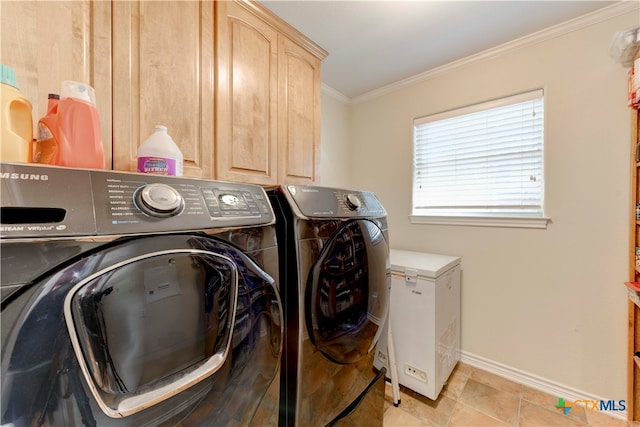 laundry area with cabinets, separate washer and dryer, ornamental molding, and light tile patterned floors