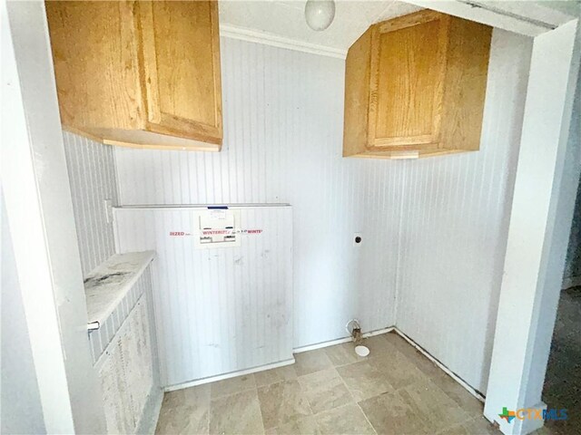 502 E Live Oak St, Cuero, TX 77954 - laundry area featuring hookup for an electric dryer, cabinets, and crown molding