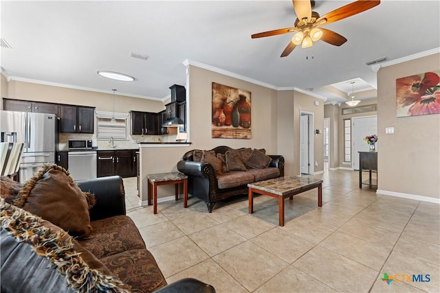 living room featuring ceiling fan, visible vents, ornamental molding, and light tile patterned floors
