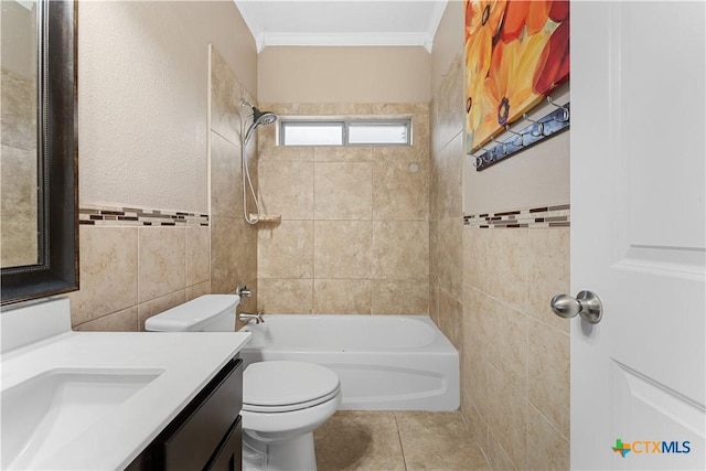 full bathroom featuring crown molding, vanity, tile patterned flooring, toilet, and tile walls
