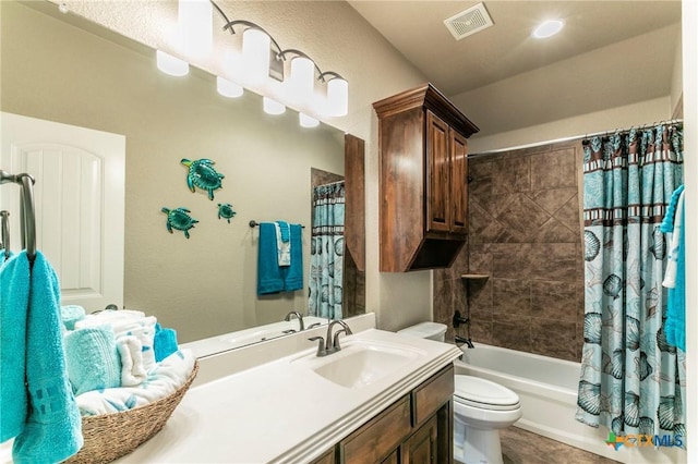 full bath featuring visible vents, vanity, toilet, and shower / tub combo with curtain