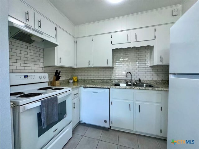 2918 Antelope Trl, Temple, TX 76504 - kitchen featuring sink, white appliances, light tile patterned floors, backsplash, and white cabinets