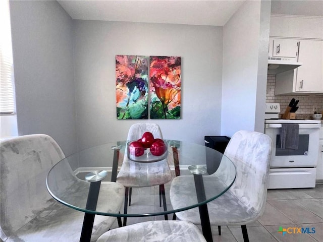 2918 Antelope Trl, Temple, TX 76504 - dining room with light tile patterned floors