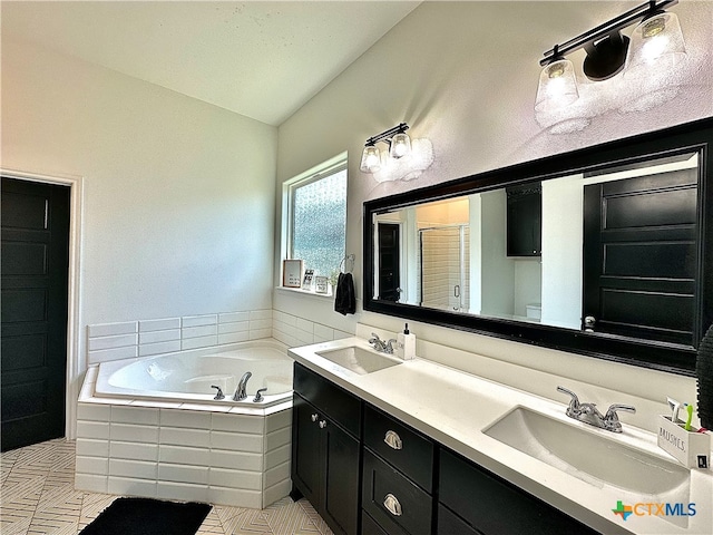 bathroom with vanity, plus walk in shower, and lofted ceiling