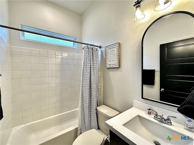 full bathroom featuring vanity, toilet, and shower / tub combo