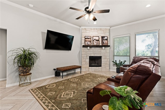 2823 Pistoia Trl, Temple, TX 76502 - living room featuring ceiling fan, crown molding, a stone fireplace, and recessed lighting