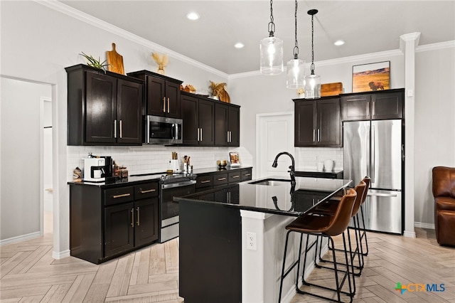 2823 Pistoia Trl, Temple, TX 76502 - kitchen with stainless steel appliances, dark countertops, a breakfast bar, decorative backsplash, and an island with sink