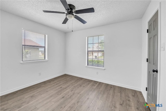 2316 Schwertner Dr, Killeen, TX 76543 - unfurnished room with wood finished floors, a textured ceiling, and ceiling fan
